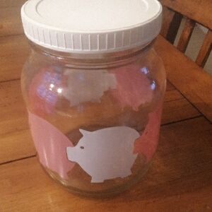 Food Storage Jar with Pink and White Pig Design